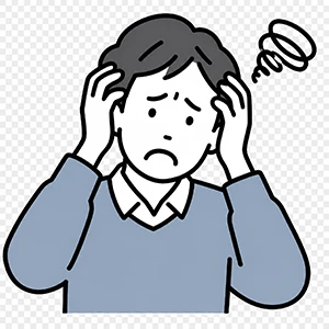 不安そうに頭を抱える男性